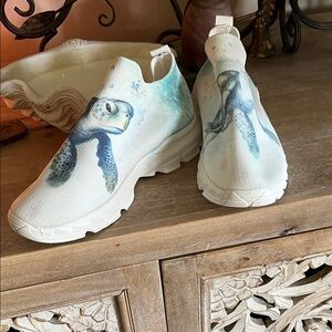 White Slip-On Sneakers with Turtle Design